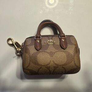 Mini Rowan Bag Charm
In Signature Canvas